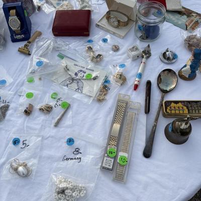 Sale Photo Thumbnail #82: Costume jewelry, watches, advertising pens, collectibles, vases of jewelry,
DOES NOT INCLUDE: table or tablecloth
