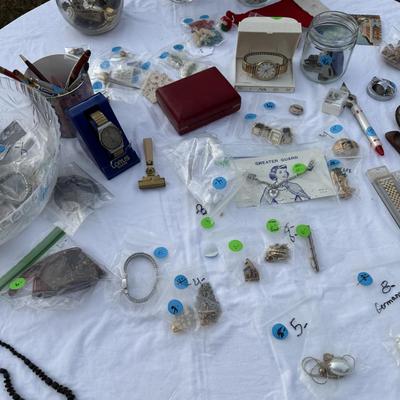 Sale Photo Thumbnail #83: Costume jewelry, watches, advertising pens, collectibles, vases of jewelry,
DOES NOT INCLUDE: table or tablecloth