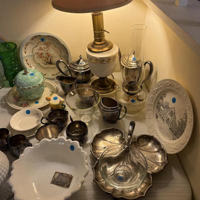 Sale Photo Thumbnail #101: China, crystal, silverplate tea sets, lamps, serve ware, ladder back chair, musical ornaments, large gesso mirror, milk glass, murano, colored glass, framed artwork, decorative platewall plates, walll pocket, etc
DOES NOT INCLUDE: table, tablecloth, plate
