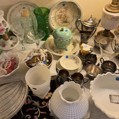 Sale Photo Thumbnail #100: China, crystal, silverplate tea sets, lamps, serve ware, ladder back chair, musical ornaments, large gesso mirror, milk glass, murano, colored glass, framed artwork, decorative platewall plates, walll pocket, etc
DOES NOT INCLUDE: table, tablecloth, plate