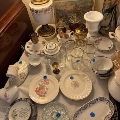 Sale Photo Thumbnail #98: China, crystal, silverplate tea sets, lamps, serve ware, ladder back chair, musical ornaments, large gesso mirror, milk glass, murano, colored glass, framed artwork, decorative platewall plates, walll pocket, etc
DOES NOT INCLUDE: table, tablecloth, plate