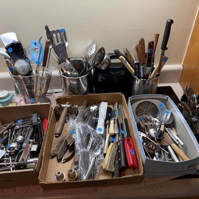 Sale Photo Thumbnail #118: Microwave, dishes, glassware, carafes, milk glass, utensils, home decor, dish drain, bottles, fondue pot, candle stands, etc
DOES NOT INCLUDE 2 plastic shelving, plate stands, plate racks