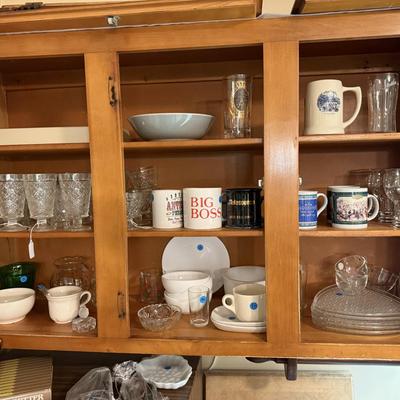 Sale Photo Thumbnail #120: Microwave, dishes, glassware, carafes, milk glass, utensils, home decor, dish drain, bottles, fondue pot, candle stands, etc
DOES NOT INCLUDE 2 plastic shelving, plate stands, plate racks