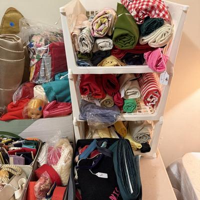 Sale Photo Thumbnail #136: Cavalier sewing machine in cabinet w/chair, lamp, sewing supplies, notions, material, lace, framed artwork 
DOES NOT INCLUDE: table, stacking baskets