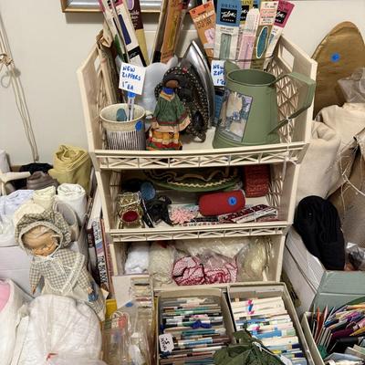 Sale Photo Thumbnail #138: Cavalier sewing machine in cabinet w/chair, lamp, sewing supplies, notions, material, lace, framed artwork 
DOES NOT INCLUDE: table, stacking baskets