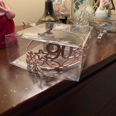Sale Photo Thumbnail #143: Chest of drawers, lamps mirror, dresser top decor, 90 year old birthday tiara 
DOES NOT INCLUDE PLATE STAND