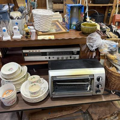 Sale Photo Thumbnail #157: 1st garage middle section
Records, China, coffee table, tow bar, cigar boxes, miscellaneous, toaster oven, card table
DOES NOT INCLUDE: Wooden tables,