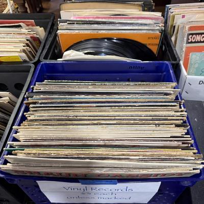 Sale Photo Thumbnail #150: 1st garage middle section
Records, China, coffee table, tow bar, cigar boxes, miscellaneous, toaster oven, card table
DOES NOT INCLUDE: Wooden tables,
