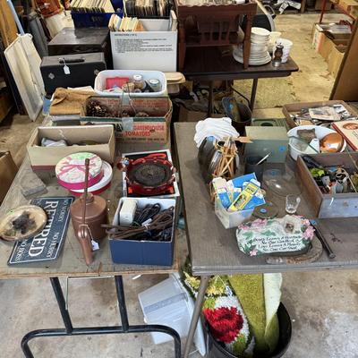 Sale Photo Thumbnail #145: 1st garage middle section
Records, China, coffee table, tow bar, cigar boxes, miscellaneous, toaster oven, card table
DOES NOT INCLUDE: Wooden tables,