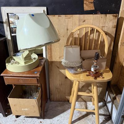 Sale Photo Thumbnail #161: Middle garage:
Buffet, dresser, butcher block table top only, chair, mirror, books, lamp, hairdryer, glassware, rolling trashcan, Electrolux parts, etc