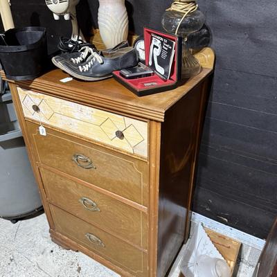 Sale Photo Thumbnail #163: Middle garage:
Buffet, dresser, butcher block table top only, chair, mirror, books, lamp, hairdryer, glassware, rolling trashcan, Electrolux parts, etc
