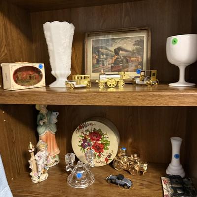Sale Photo Thumbnail #170: Christmas decor, MCM cart, bookshelf, angels, miscellaneous, railroad collectibles, milk glass
DOES NOT INCLUDE TABLE, TABLECLOTH, plastic shelf, plate stands,
