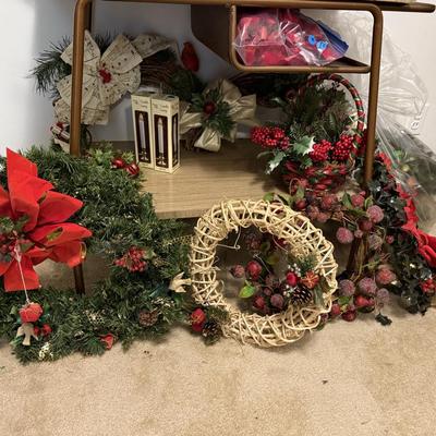 Sale Photo Thumbnail #168: Christmas decor, MCM cart, bookshelf, angels, miscellaneous, railroad collectibles, milk glass
DOES NOT INCLUDE TABLE, TABLECLOTH, plastic shelf, plate stands,