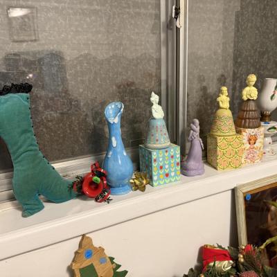 Sale Photo Thumbnail #166: Christmas decor, MCM cart, bookshelf, angels, miscellaneous, railroad collectibles, milk glass
DOES NOT INCLUDE TABLE, TABLECLOTH, plastic shelf, plate stands,