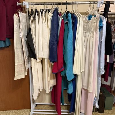 Sale Photo Thumbnail #180: Women’s vintage clothing, shoes, purses, art work, file cabinet, clothes rack, curtains, 
DOES NOT INCLUDE TABLE, sorting containers, plastic shelf, large basket, lamp