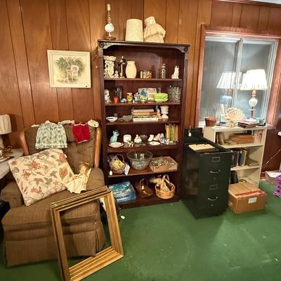 Sale Photo Thumbnail #210: LaZBoy recliner, frames, doll & clothes, Knick knacks, lamps, file cabinet, books, Braddock High School yearbooks, framed art, & more
DOES NOT INCLUDE 2 wooden bookshelves