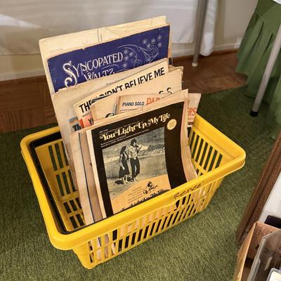 Sale Photo Thumbnail #223: Rocker, wing back chair w/ottoman, carved cherub lamp, milk glass, dish set, crystal, china, tea cups, vases, colored glass, sheet music, frames, Boy Scouts, silver-plate, pottery, large vase, floor lamp, Christmas music, yukele, Bibles
DOES NOT INCLUDE T