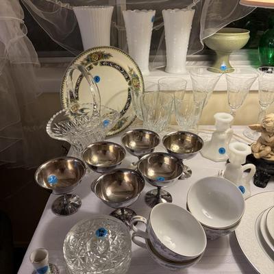 Sale Photo Thumbnail #228: Rocker, wing back chair w/ottoman, carved cherub lamp, milk glass, dish set, crystal, china, tea cups, vases, colored glass, sheet music, frames, Boy Scouts, silver-plate, pottery, large vase, floor lamp, Christmas music, yukele, Bibles
DOES NOT INCLUDE T
