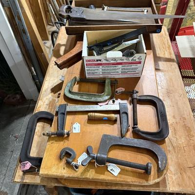 Sale Photo Thumbnail #242: Lawn & garden tools, lawn chemicals, sprayers, bottles, coolers, wooden tool box, glassware, c clamps, hand tools, mirror, project table, wooden shelf, tile cutter, hand saws & more
DOES NOT INCLUDE BLACK PLASTIC SHELF & RED METAL SHELF