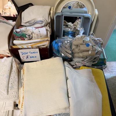 Sale Photo Thumbnail #277: Bed, bath, & kitchen linens, office supplies, vases, milk glass, personal hygiene items, mirror, wall decor, games & more
DOES NOT INCLUDE TABLE, GRAY PLASTIC SHELVING, BROWN PLASTIC SHELVING,