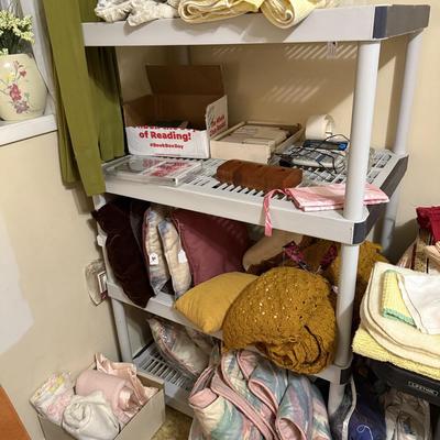 Sale Photo Thumbnail #280: Bed, bath, & kitchen linens, office supplies, vases, milk glass, personal hygiene items, mirror, wall decor, games & more
DOES NOT INCLUDE TABLE, GRAY PLASTIC SHELVING, BROWN PLASTIC SHELVING,