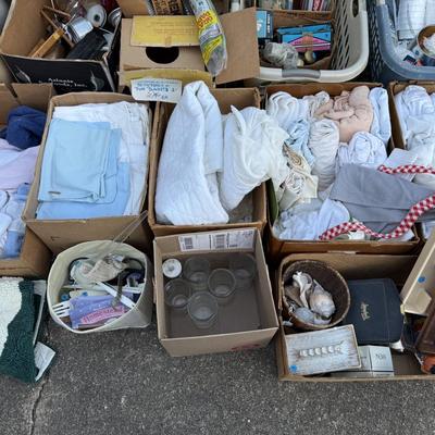 Sale Photo Thumbnail #293: Pans, linens, Tupperware, frames, light fixtures, toys, paper goods, bakeware, new lamp shades, new oak bathroom towel racks & more