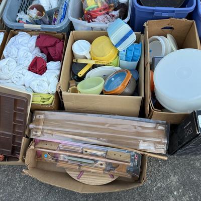 Sale Photo Thumbnail #295: Pans, linens, Tupperware, frames, light fixtures, toys, paper goods, bakeware, new lamp shades, new oak bathroom towel racks & more