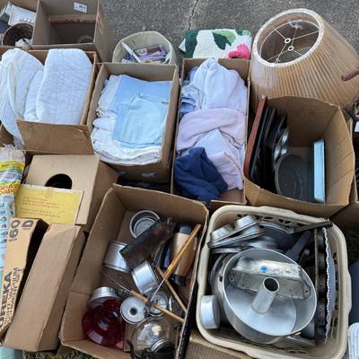 Sale Photo Thumbnail #289: Pans, linens, Tupperware, frames, light fixtures, toys, paper goods, bakeware, new lamp shades, new oak bathroom towel racks & more