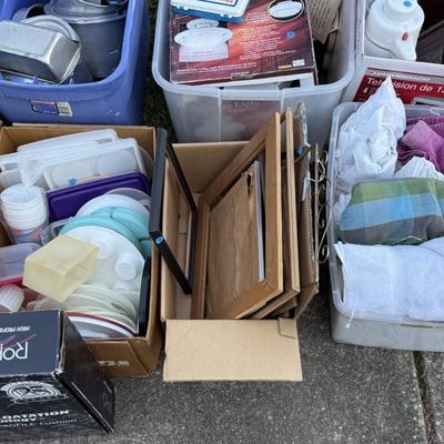Sale Photo Thumbnail #294: Pans, linens, Tupperware, frames, light fixtures, toys, paper goods, bakeware, new lamp shades, new oak bathroom towel racks & more