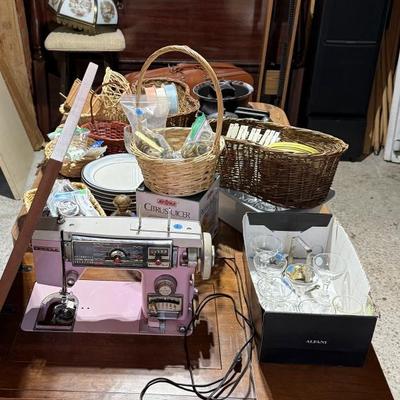 Sale Photo Thumbnail #296: Middle garage: bed, counter chair, currier & Ives hanging light, luggage, pottery vases, sewing machine, canopy, Formica kitchen table, dvd/cd stand, dishes, glassware, misc