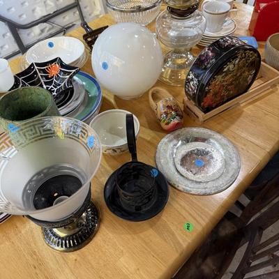 Sale Photo Thumbnail #298: Middle garage: bed, counter chair, currier & Ives hanging light, luggage, pottery vases, sewing machine, canopy, Formica kitchen table, dvd/cd stand, dishes, glassware, misc