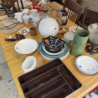Sale Photo Thumbnail #299: Middle garage: bed, counter chair, currier & Ives hanging light, luggage, pottery vases, sewing machine, canopy, Formica kitchen table, dvd/cd stand, dishes, glassware, misc