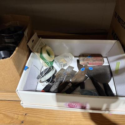 Sale Photo Thumbnail #315: Middle garage: saw horses, long boards, misc kitchen items, fan, cabinet, chair, painting tools, coffee maker, toaster, toaster ovens, hanging lamp, scrap wood, & more