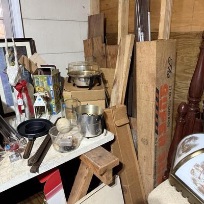 Sale Photo Thumbnail #312: Middle garage: saw horses, long boards, misc kitchen items, fan, cabinet, chair, painting tools, coffee maker, toaster, toaster ovens, hanging lamp, scrap wood, & more