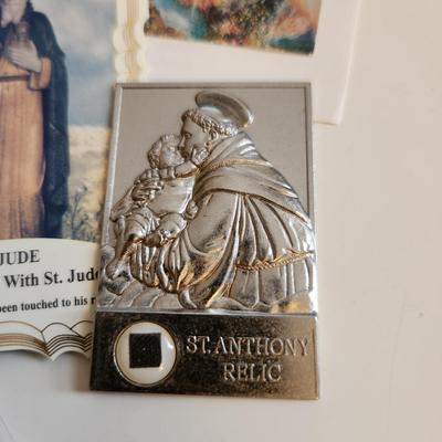 Sale Photo Thumbnail #217: This auction lot is for a gathering of Religious Relics, Beads, Medal & Prayer Cards.  This grouping includes "touched-to" relics of St. Jude, St. Theresa, St. Francis of Assissi and St. Faustina.  Also included is a St. Theresa Chaplet of Beads and a med