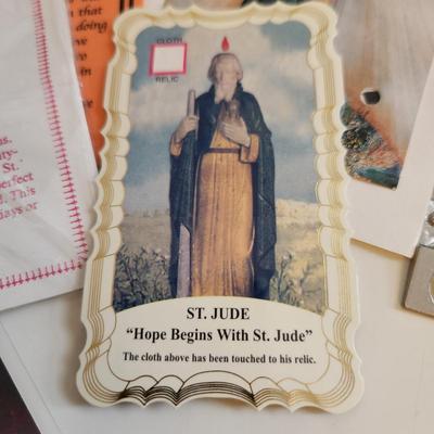 Sale Photo Thumbnail #219: This auction lot is for a gathering of Religious Relics, Beads, Medal & Prayer Cards.  This grouping includes "touched-to" relics of St. Jude, St. Theresa, St. Francis of Assissi and St. Faustina.  Also included is a St. Theresa Chaplet of Beads and a med
