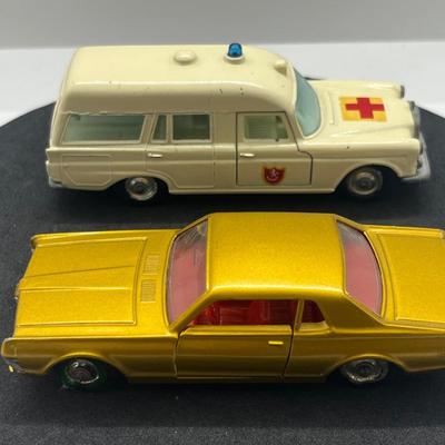 LOT 98: Vintage Lesney Matchbox Vehicles - Mercedes Benz Binz Ambulance and Mercury Cougar