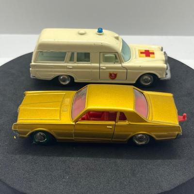 LOT 98: Vintage Lesney Matchbox Vehicles - Mercedes Benz Binz Ambulance and Mercury Cougar