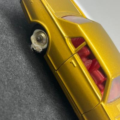 LOT 98: Vintage Lesney Matchbox Vehicles - Mercedes Benz Binz Ambulance and Mercury Cougar