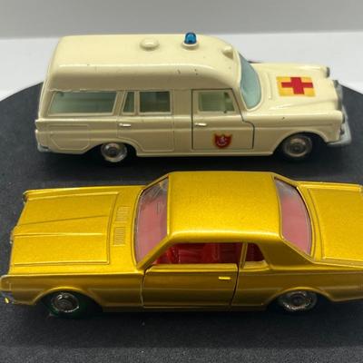 LOT 98: Vintage Lesney Matchbox Vehicles - Mercedes Benz Binz Ambulance and Mercury Cougar