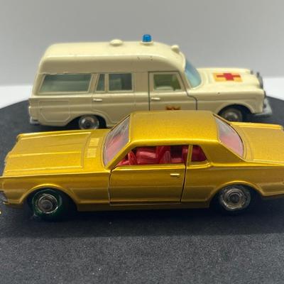 LOT 98: Vintage Lesney Matchbox Vehicles - Mercedes Benz Binz Ambulance and Mercury Cougar