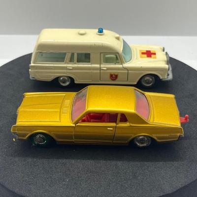 LOT 98: Vintage Lesney Matchbox Vehicles - Mercedes Benz Binz Ambulance and Mercury Cougar