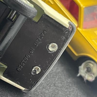 LOT 98: Vintage Lesney Matchbox Vehicles - Mercedes Benz Binz Ambulance and Mercury Cougar