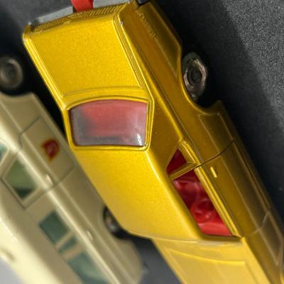 LOT 98: Vintage Lesney Matchbox Vehicles - Mercedes Benz Binz Ambulance and Mercury Cougar