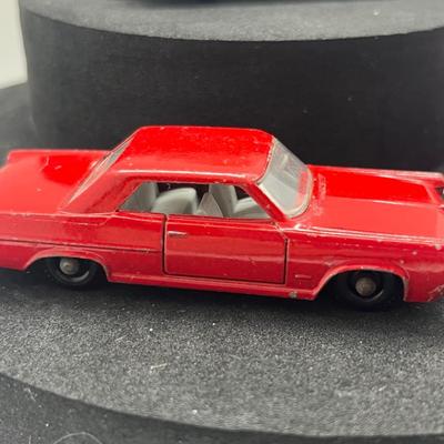 LOT 102: Vintage Lesney Matchbox Cars - Ford Anglia, Pontiac GP Sports Coupe, Volkswagen 1600TL