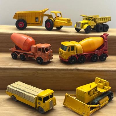 LOT 106: Vintage Lesney Matchbox Construction Vehicles - Caterpillar Bulldozer, Foden Cement Mixer, Foden Concrete Truck and More