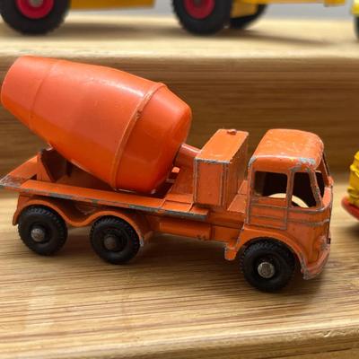 LOT 106: Vintage Lesney Matchbox Construction Vehicles - Caterpillar Bulldozer, Foden Cement Mixer, Foden Concrete Truck and More