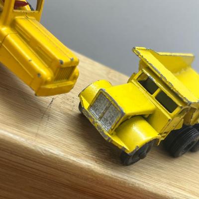 LOT 106: Vintage Lesney Matchbox Construction Vehicles - Caterpillar Bulldozer, Foden Cement Mixer, Foden Concrete Truck and More