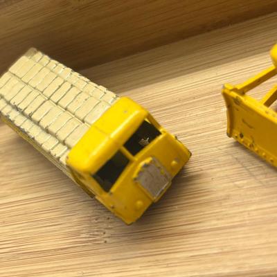 LOT 106: Vintage Lesney Matchbox Construction Vehicles - Caterpillar Bulldozer, Foden Cement Mixer, Foden Concrete Truck and More