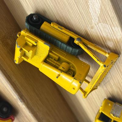 LOT 106: Vintage Lesney Matchbox Construction Vehicles - Caterpillar Bulldozer, Foden Cement Mixer, Foden Concrete Truck and More